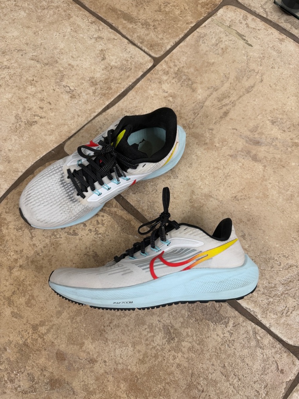 Nike Neutral-White Running Sneakers with Sky Blue, Yellow & Red Accents